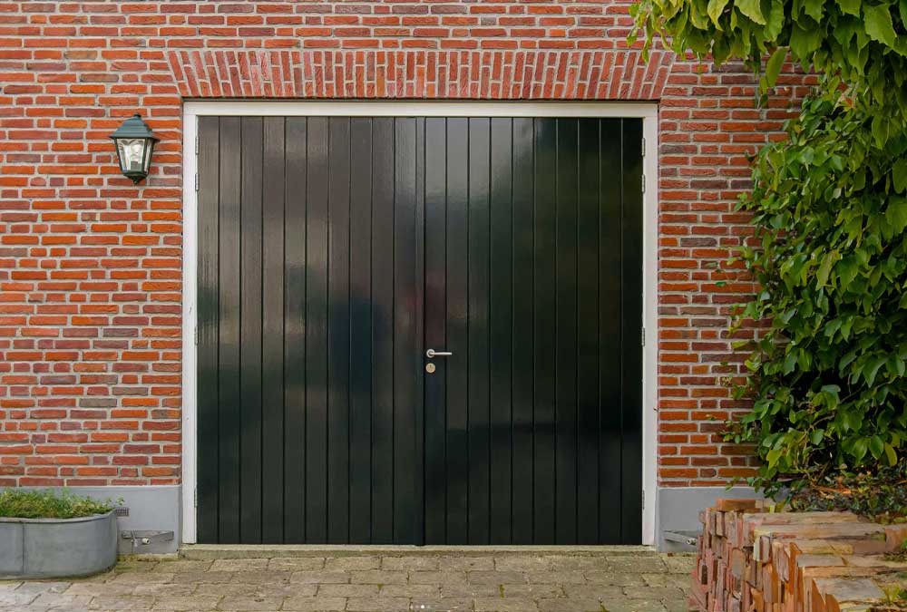 Openslaande garagedeur groen